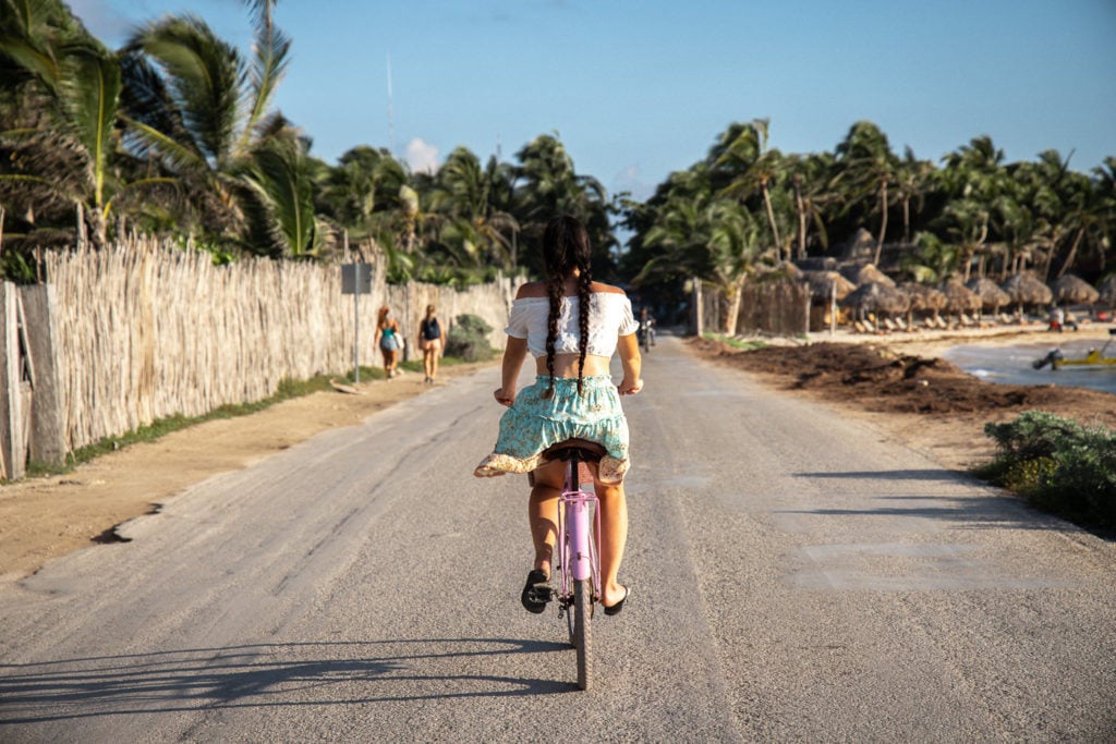 Riding a bicycle in Tulum
