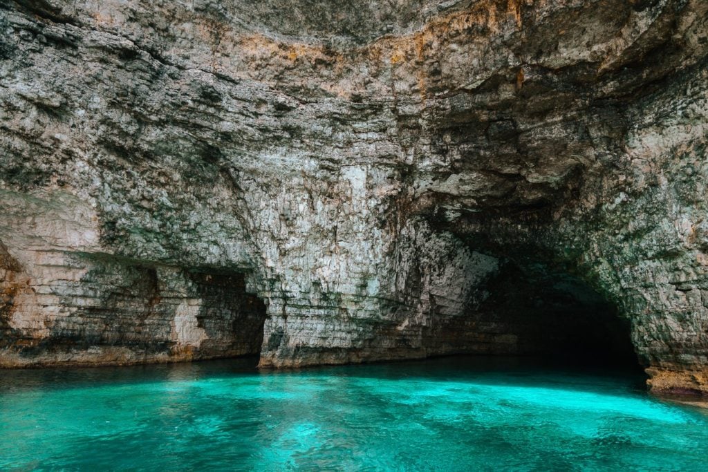 Blue water at Santa Maria Cave on Comino Island, Malta