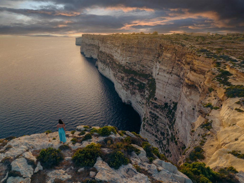 Girl at the Ta Cenc Cliffs on Gozo Island, Malta